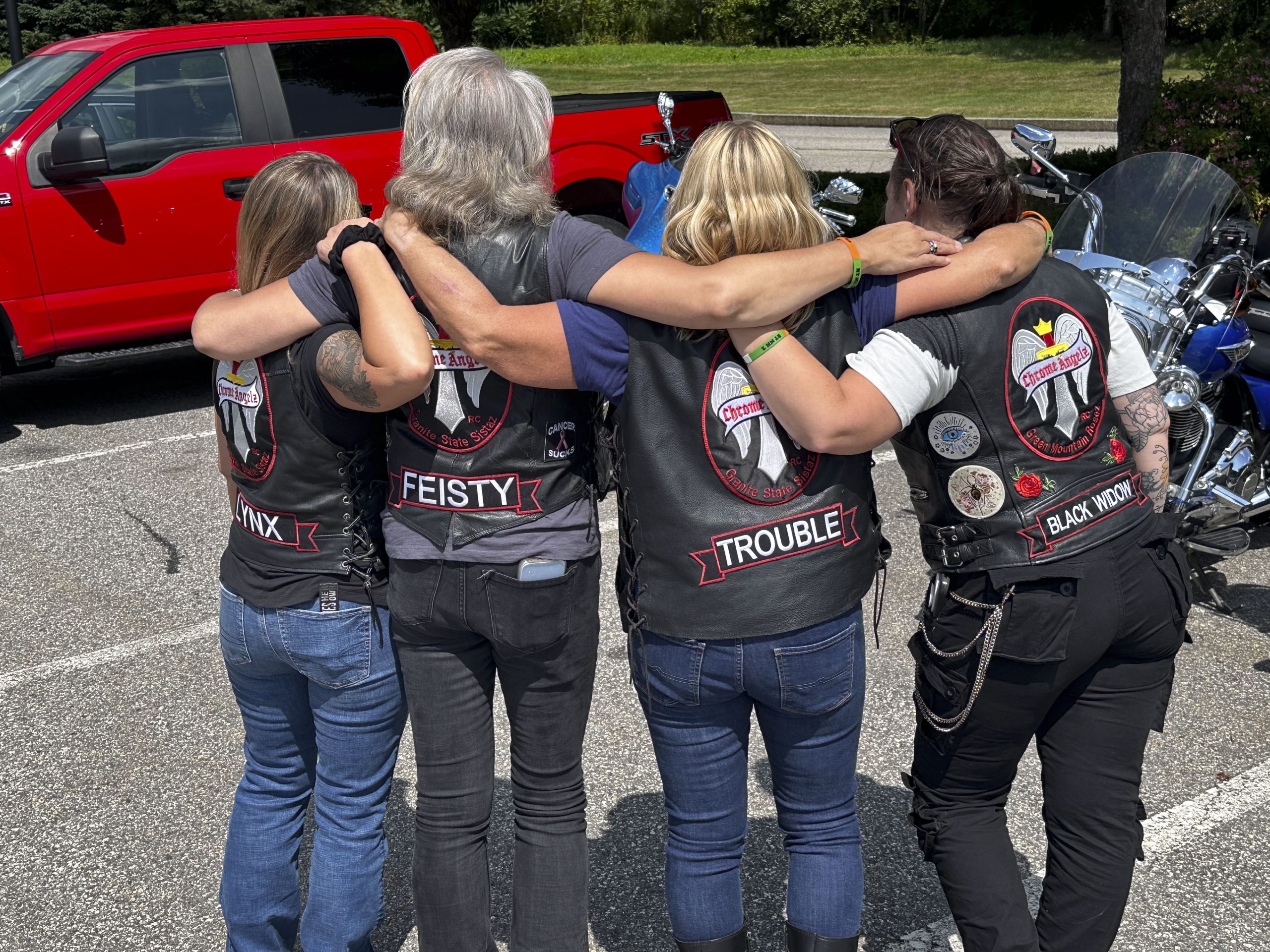 The female riding group Chrome Angelz show off their patches